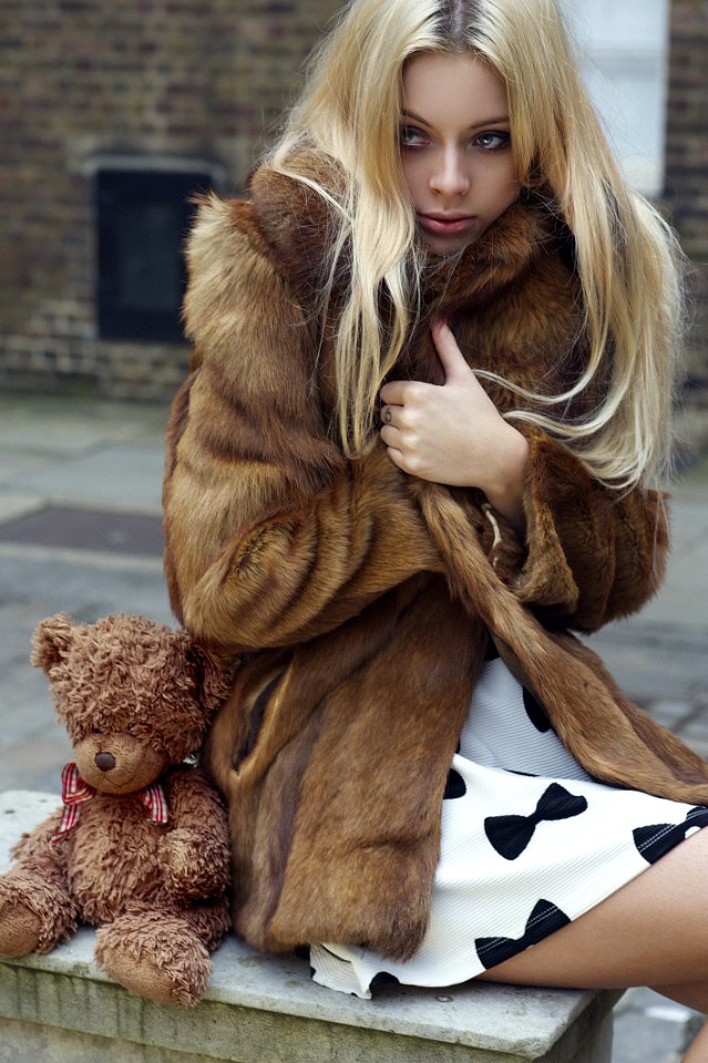Photography Of A Woman Wearing Fur Coat