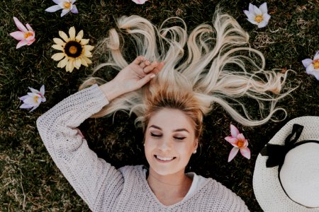 Woman Lying On Flowers photo