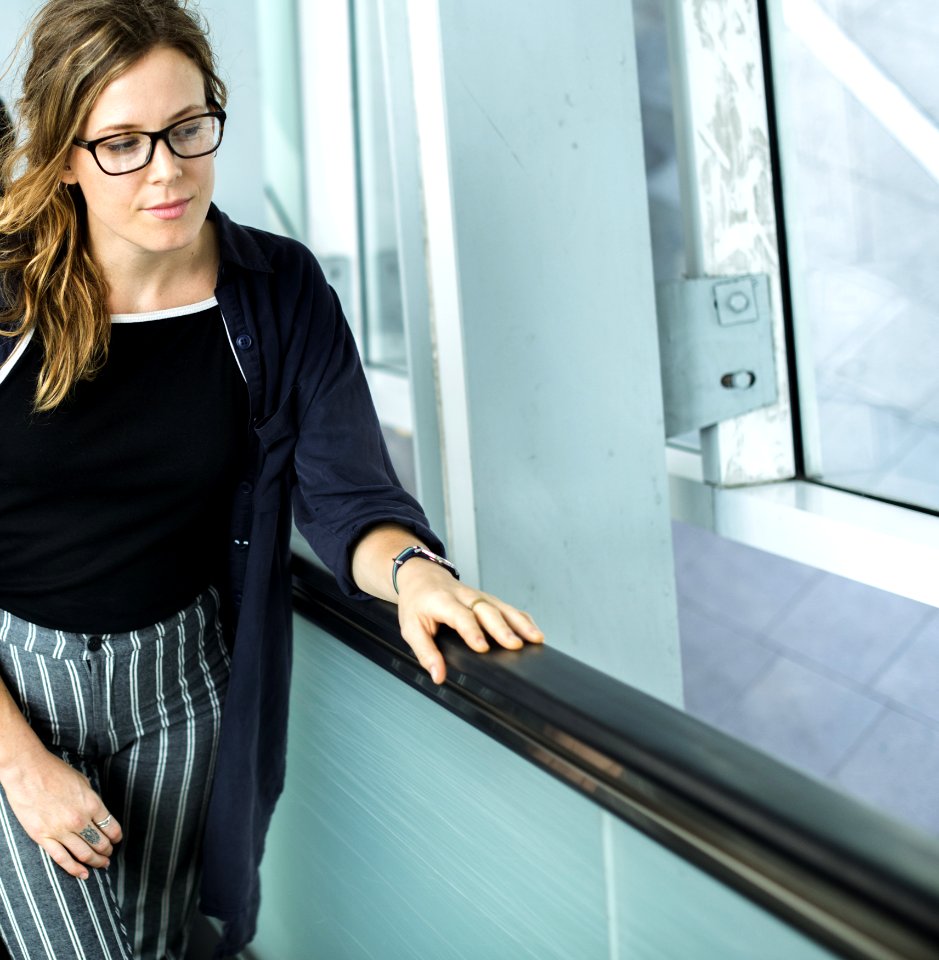 Woman In Black Cardigan Wearing Eyeglasses photo