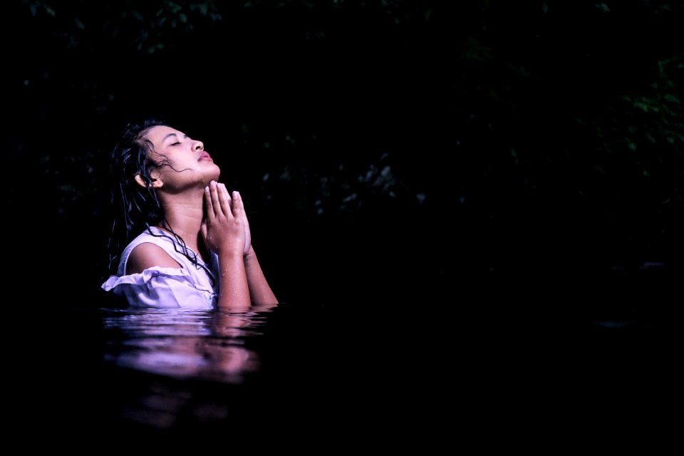 Photography Of A Woman On Water