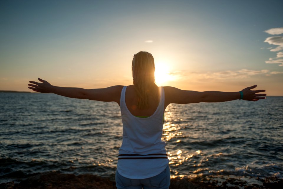 Photo Of Woman Near Ocean