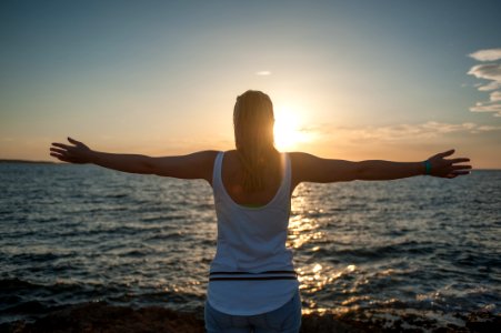 Photo Of Woman Near Ocean photo