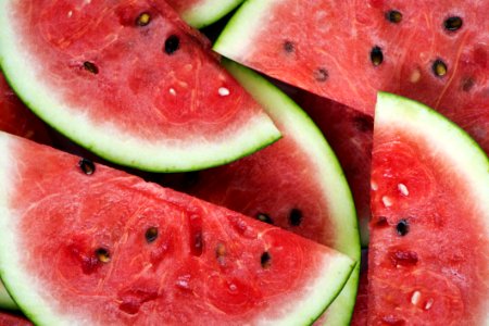 Close-Up Photography Of Sliced Watermelons photo