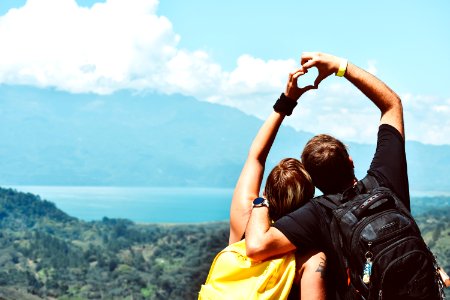 Man And Woman Forming Heart Hand Shape