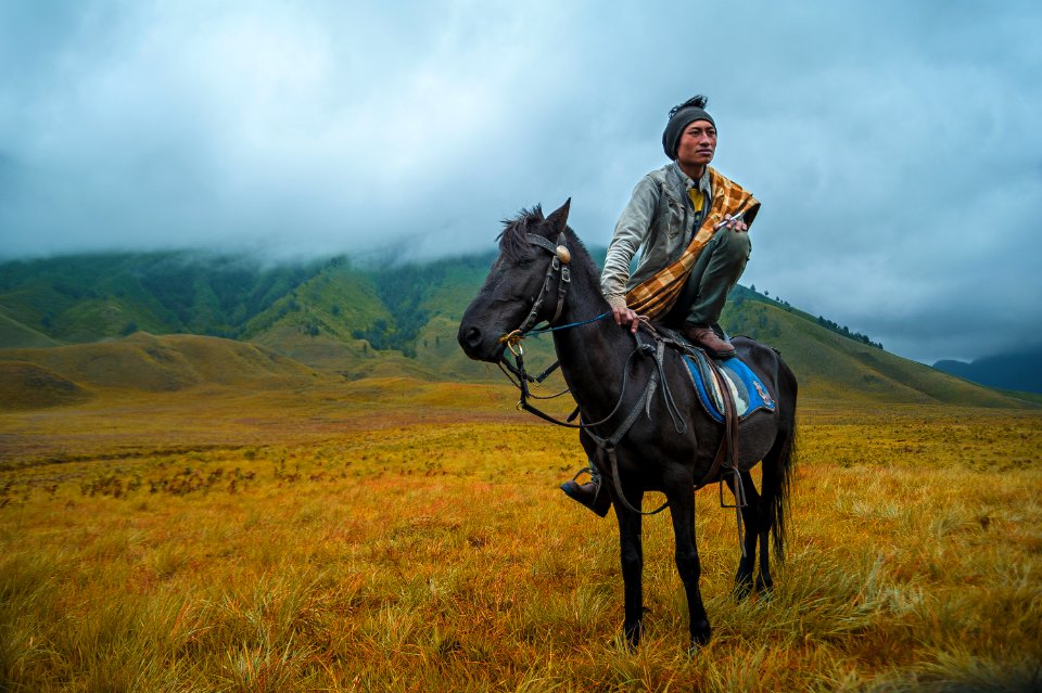 Photography Of A Person Riding A Horse