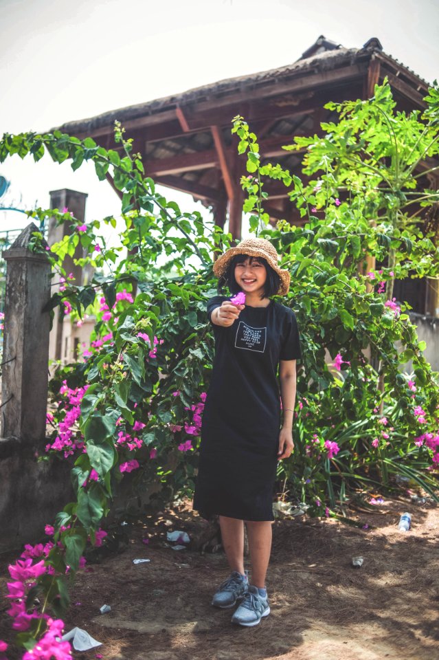 Photo Of Woman Holding Flower