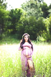 Photography Of Pregnant Woman On Grass Field photo