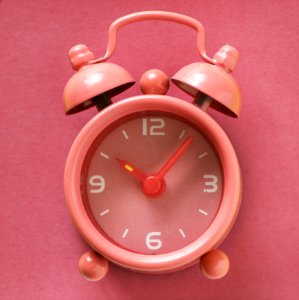 Close-Up Photography Of Alarm Clock
