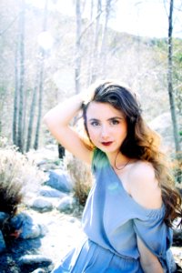 Photography Of A Woman With Curly Hair photo