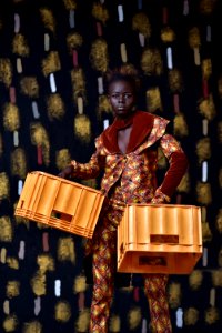 Woman Carrying Crates
