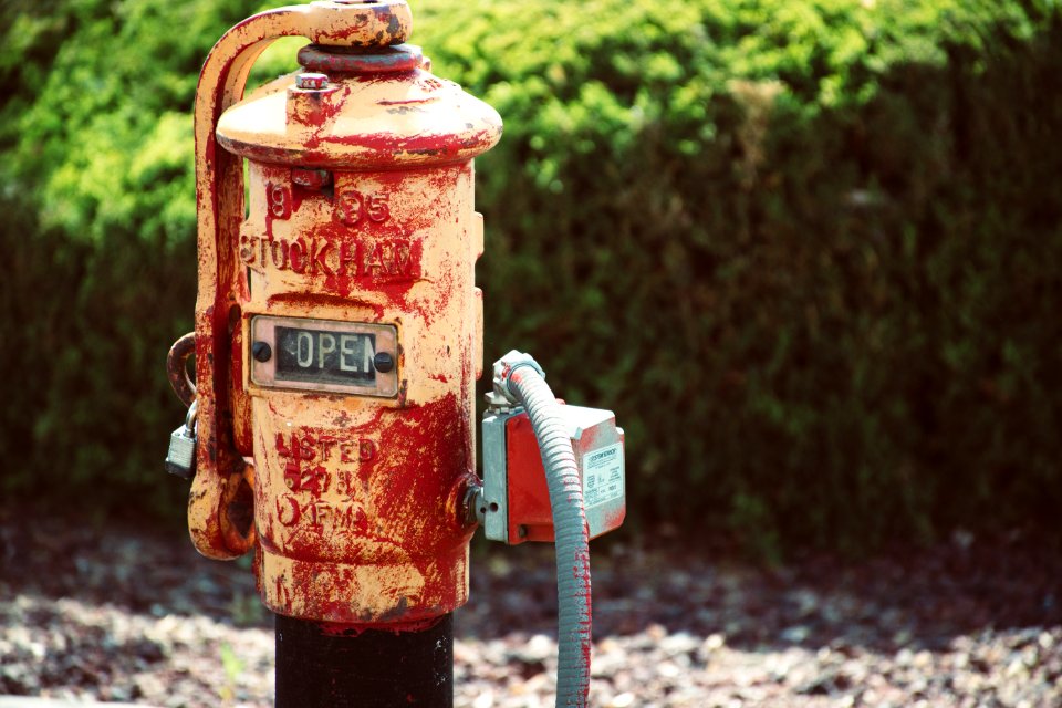 Red And Beige Metal Pipe