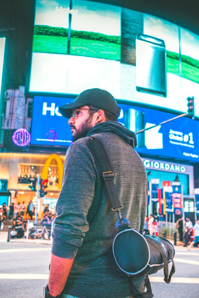 Man Wearing Black Cap