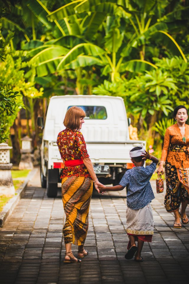 Woman Walking Holding Hand Boy