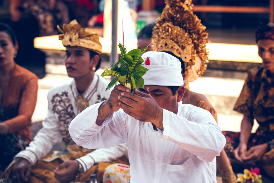 Man Holding Leaves