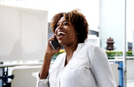 Photography Of A Woman Talking On A Phone