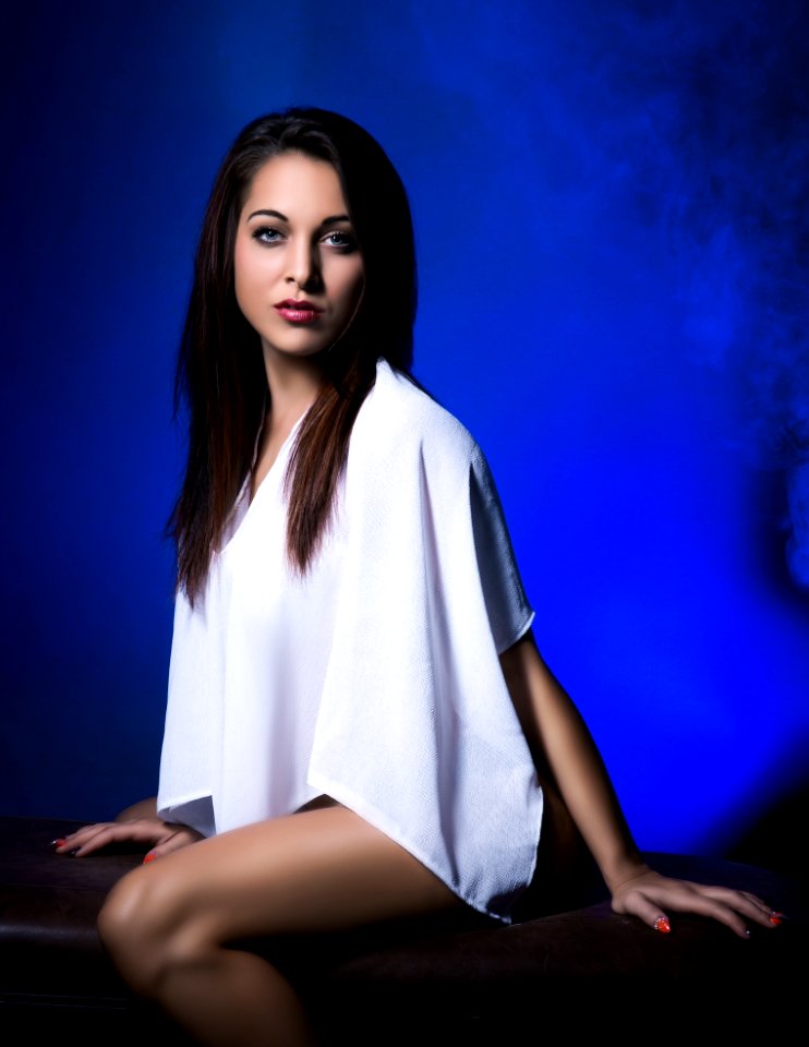 Woman In White Top