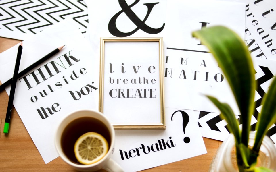 Quote Calligraphy Under Cup Of Lemon Tea