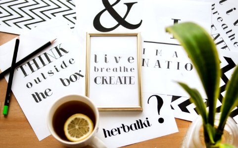 Quote Calligraphy Under Cup Of Lemon Tea