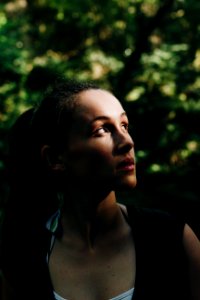 Woman Looking Up Near Tree photo