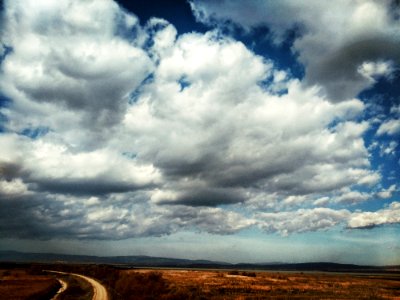 Road Under Clouds Panoramic Photography photo