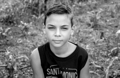 Boy Wearing Santamonic-printed Sleeveless Shirt photo