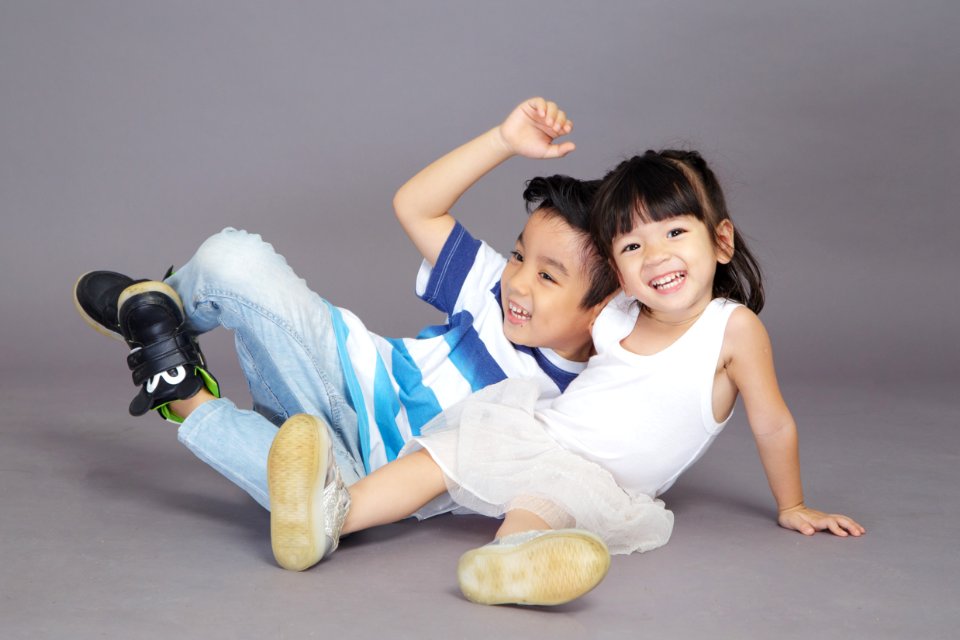 Boy And Girl Taking Picture