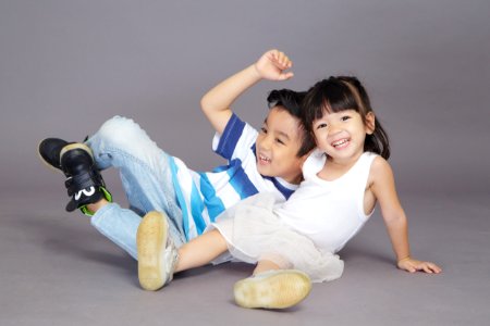 Boy And Girl Taking Picture