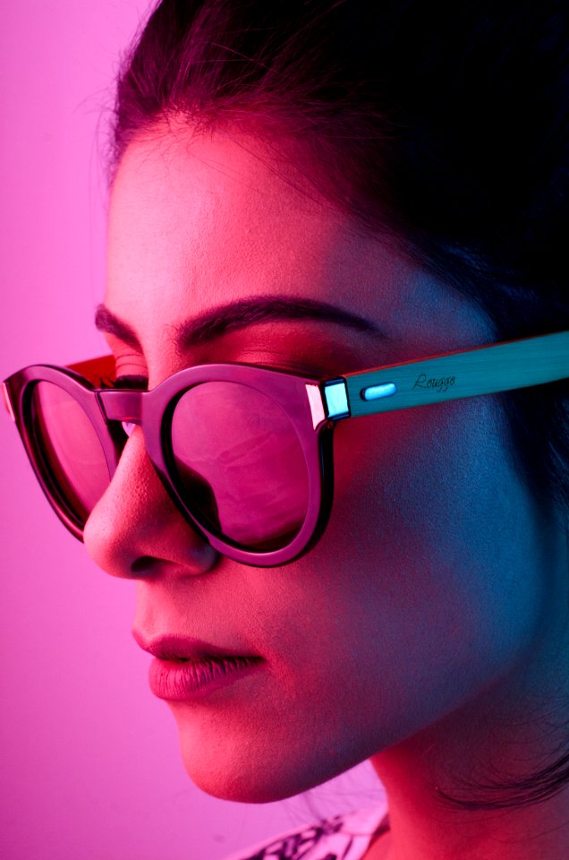 Woman Wearing Black Framed Wayfarer-style Sunglasses