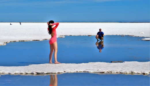 Woman In Pink Long-sleeved Swimsuit On Island photo
