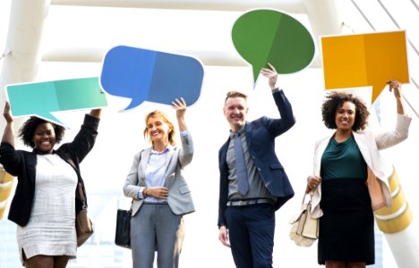 Group Of People Holding Message Boards