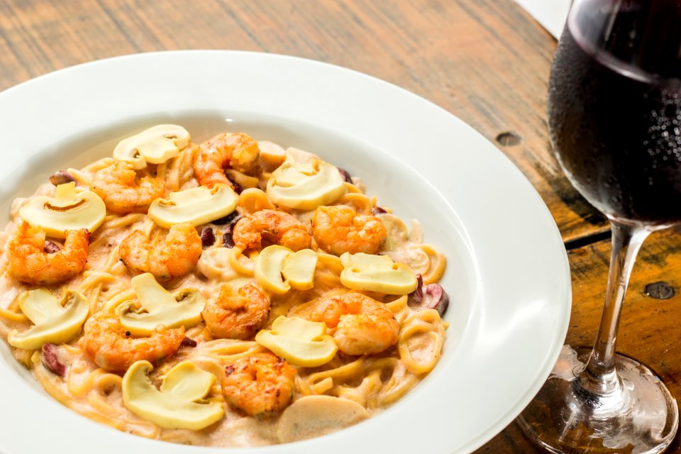Mushroom Soup On Plate Beside Wine Glass