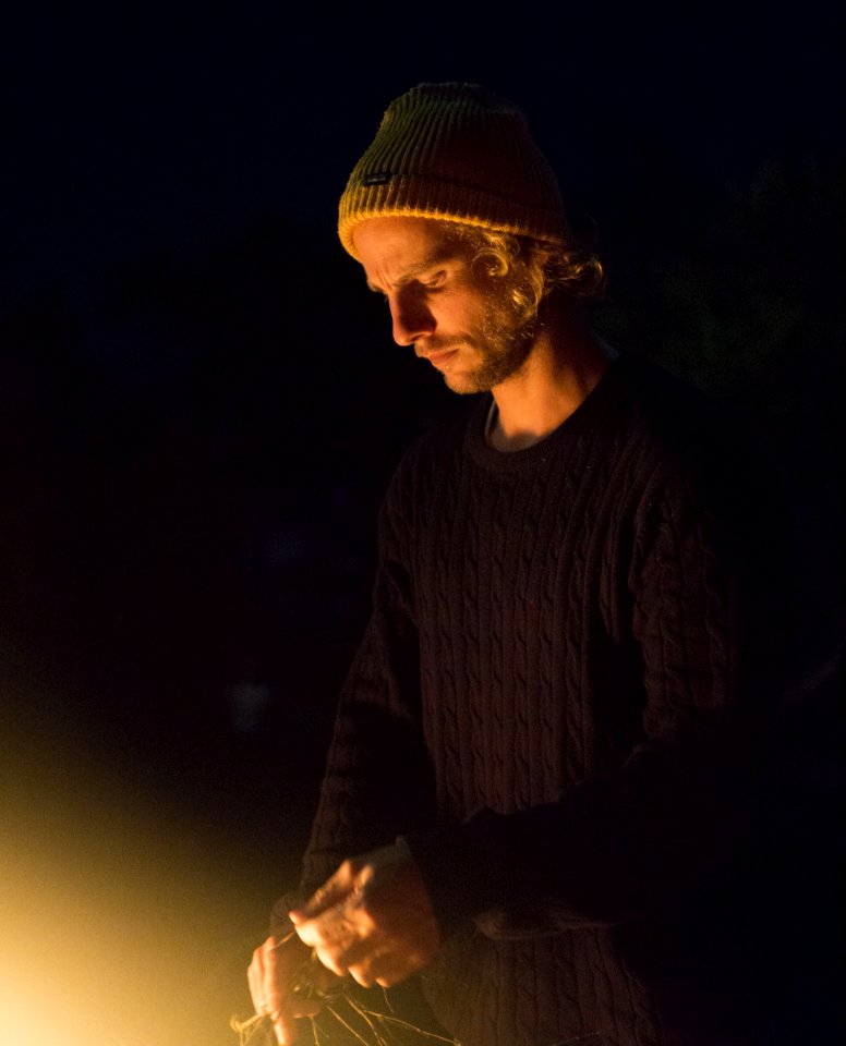 Man Wearing Black Sweater And Holding Rope