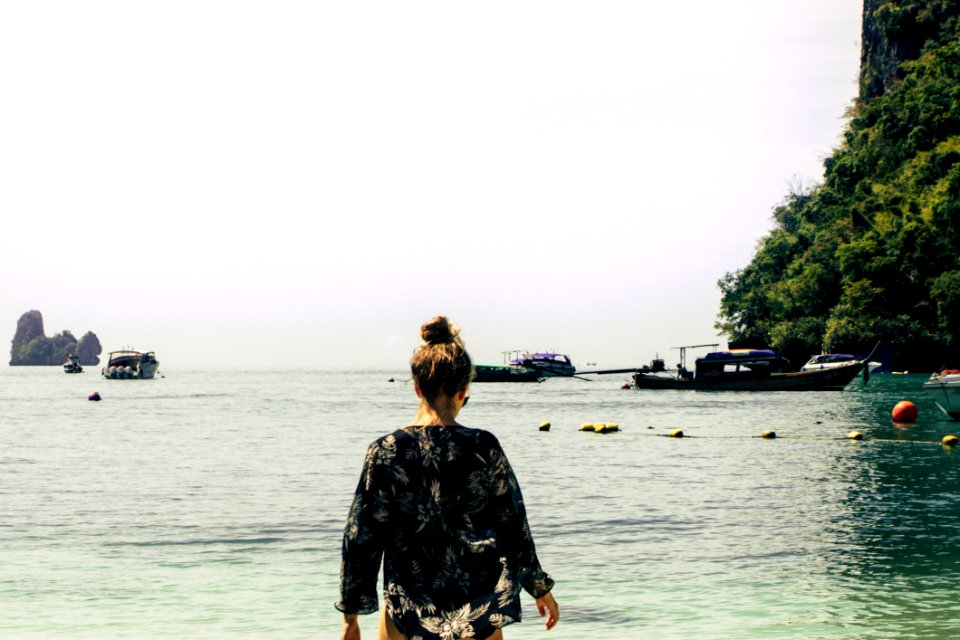 Woman Wearing Black And White Floral Top In The Beach