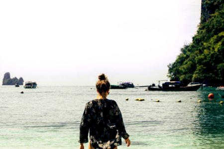 Woman Wearing Black And White Floral Top In The Beach