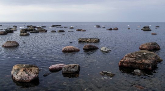 Stone In Beach Photograph