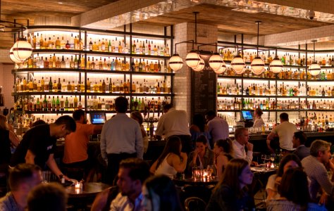 Group Of People Gathering Inside Bar photo