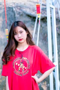 Woman Wearing Red Crew-neck T Shirt photo