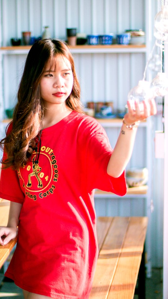 Woman Wearing Red Crew-neck Shirt