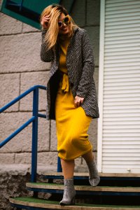 Woman Smiling While Walking On Stairs photo