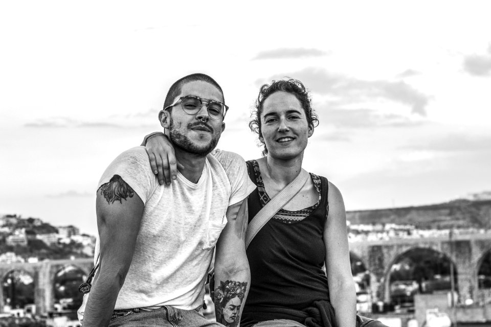 Grayscale Photograph Of Man And Woman