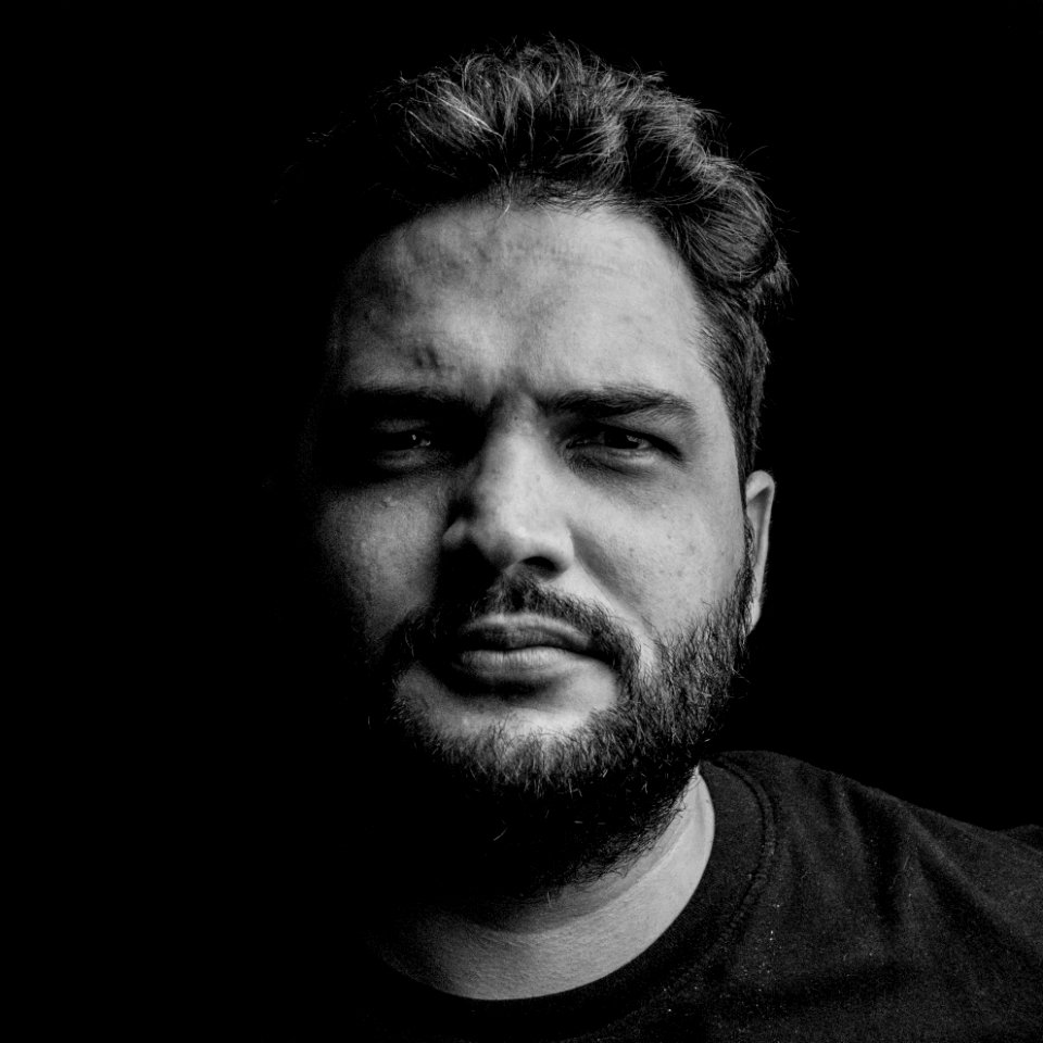 Grayscale Photo Of Man Wearing Crew-neck Top