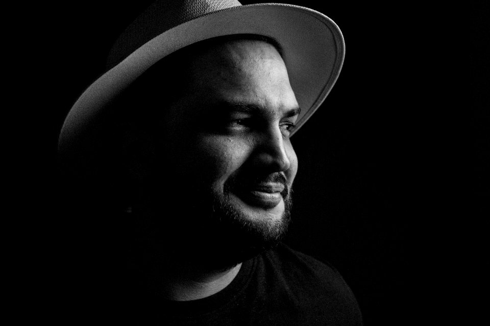 Grayscale Photo Of Man Wearing Fedora Hat