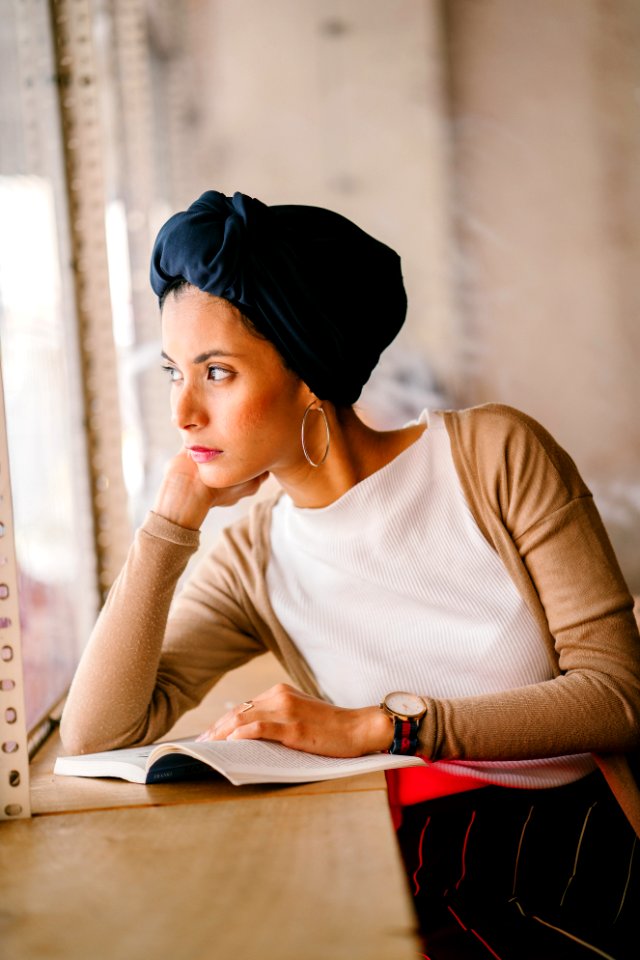Photo Of Woman Wearing Blue Headdress