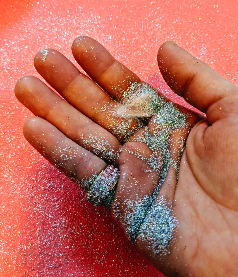 Person Holding Grey Glitter