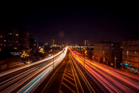 Time Lapse Photography Of Road Beside Buildings photo
