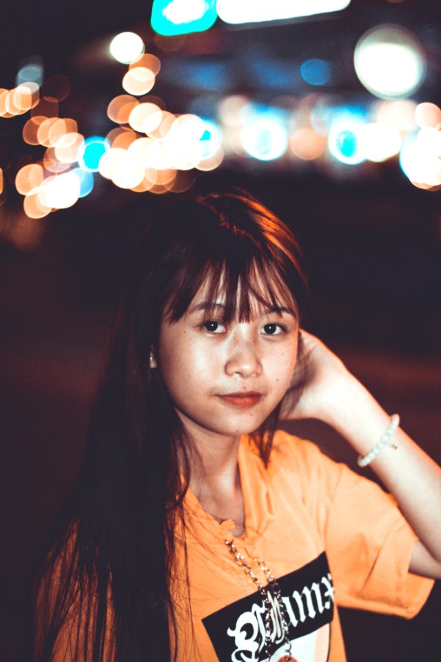 Woman Wearing Orange Crew-neck Top
