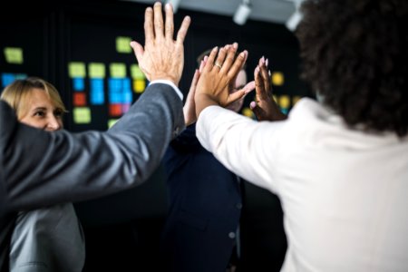 Man And Woman Doing High Five photo