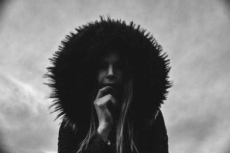 Woman Wearing Hooded Jacket Grayscale Photo photo