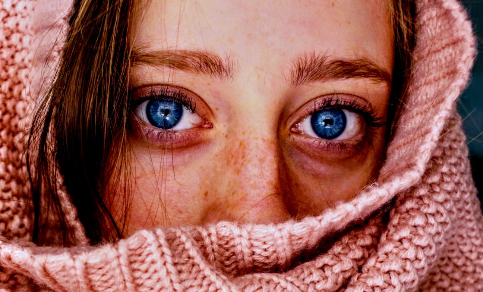 Woman With Blue Eyes Wrapped In A Pink Cloth