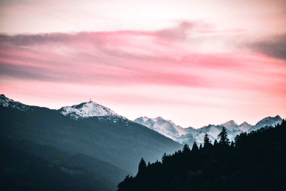 Snow Capped Mountains Under The Cloudy Skies